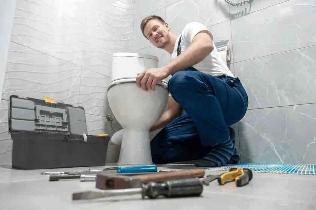 Toilet bowl repair and installation work in a Singapore home