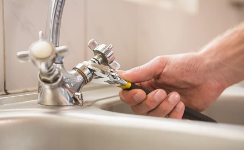 Tap and faucet replacement work in a Singapore kitchen